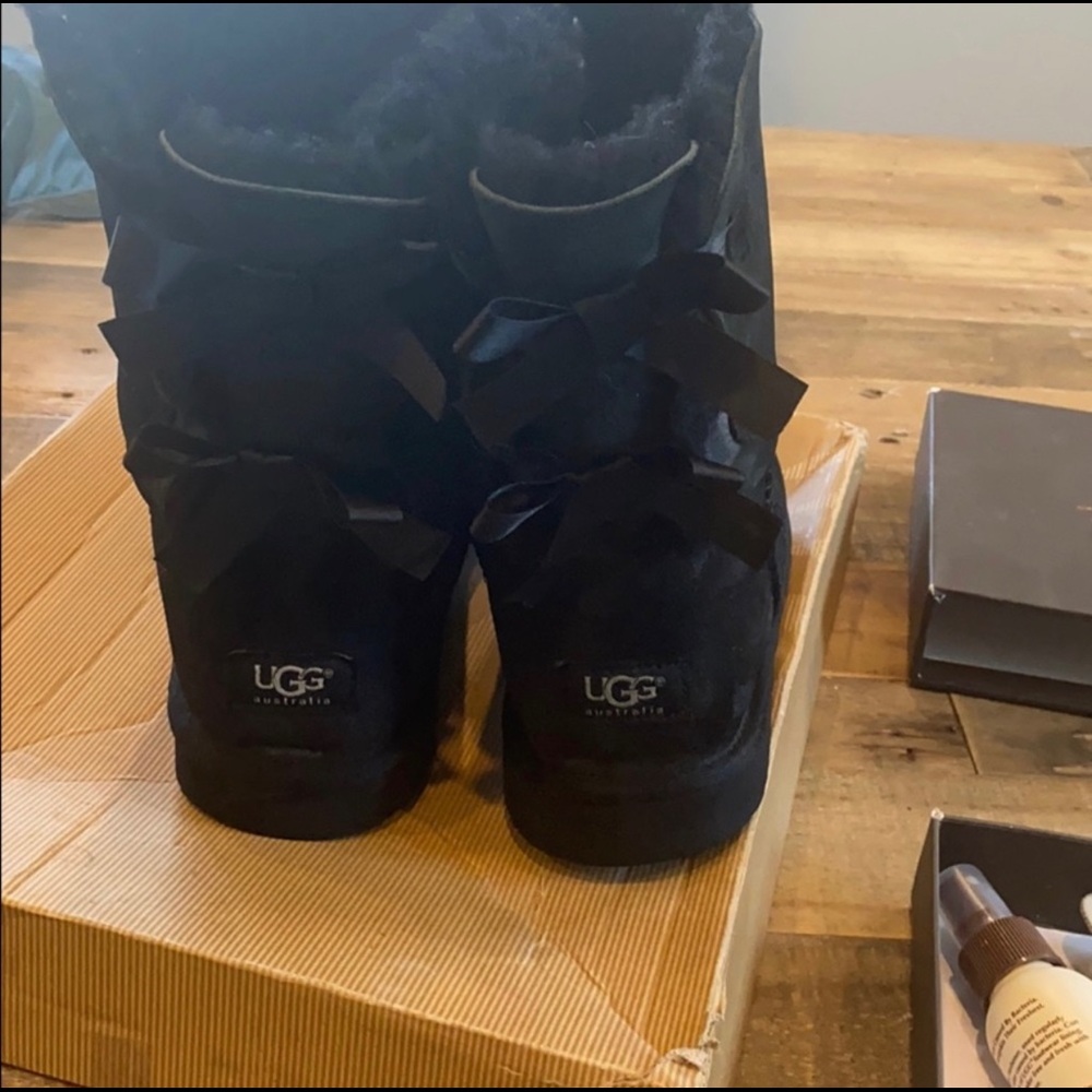 Black UGGs with bows on back